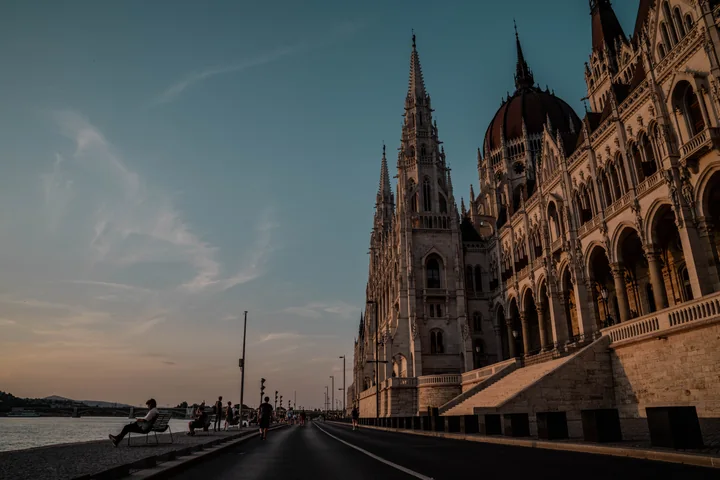 The Hungarian Parliament Building beside a quiet road
